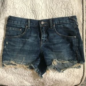 Free People distressed denim shorts
